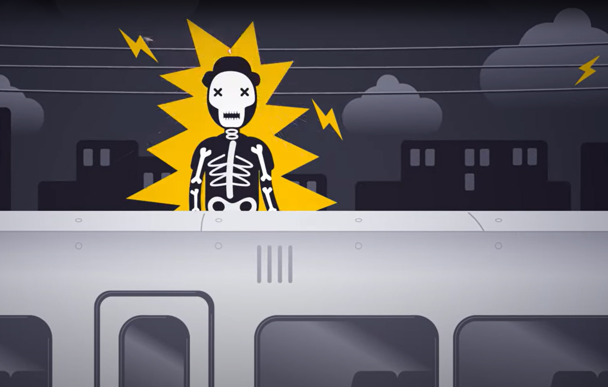 Kuvakaappaus Jätä rata rauhaan -kampanjan videolta. Kuvassa piirroshahmo on saanut sähköiskun kiivettyään junan katolle.