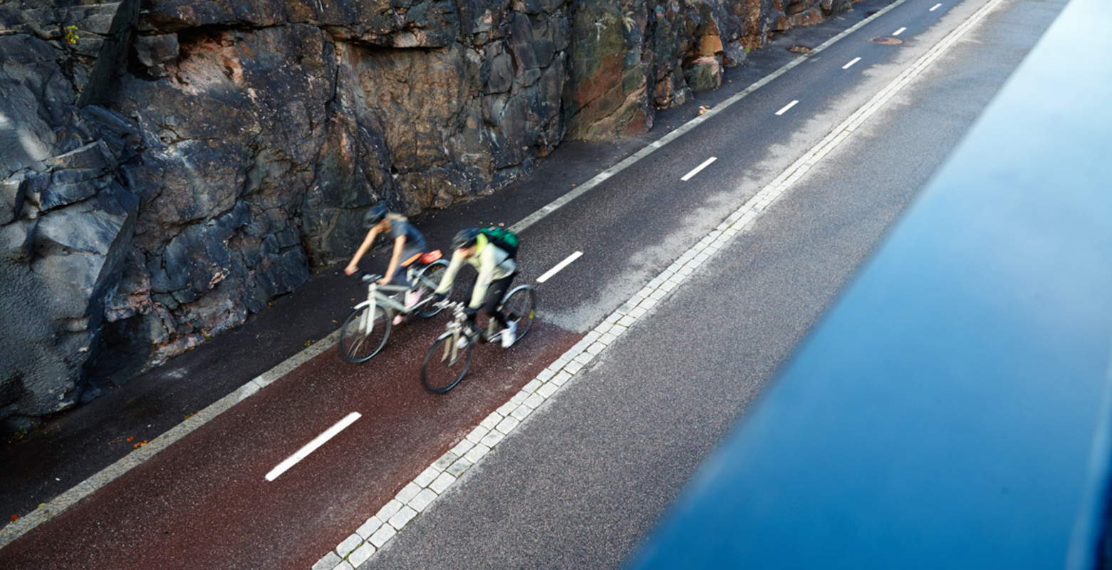 Two people cycling