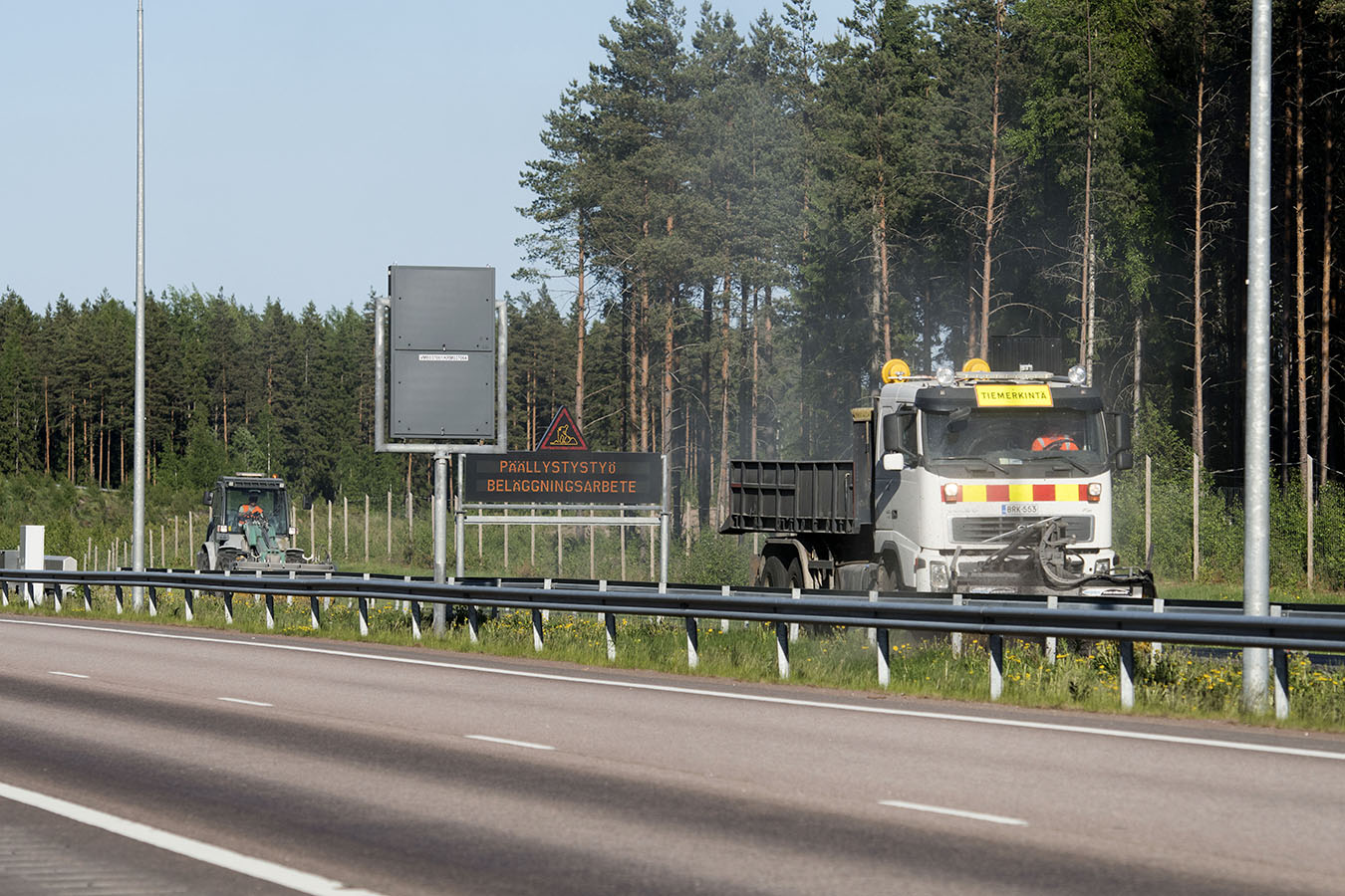 Asphalt is paved on the highway.